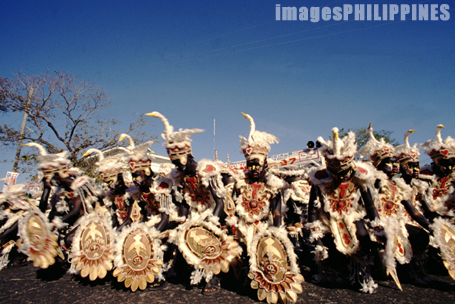 "Dinagyang Festival participants wearing Duck , 
Date Taken: 1999 take on 
Photographer/Artist: Nestor Santiago