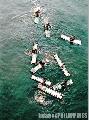 "Coin Divers, Manila Pier",
Photographer/Artist: Nestor Santiago,
Date Taken: 2002,
Place Taken: Metro Manila