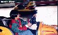 "Bump Car Ride",
Photographer/Artist: Joel Abelida ,
Date Taken: 2003,
Place Taken: Baguio City