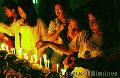 "Lighting Candles",
Photographer/Artist: Willy Lorenzana,
Date Taken: 2004,
Place Taken: San Juan, Batangas