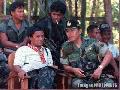"Balweg with a Military Official" ,
Photographer/Artist: Art Tibaldo ,
Date Taken: 1987,
Place Taken:  Abra,

