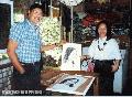 "Ben Cabrera and Model After a Sketching Session" ,
Photographer/Artist: Art Tibaldo ,
Date Taken: 2000,
Place Taken: Baguio City