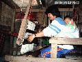 "Mother Weaving, Baby Sleeping" ,
Photographer/Artist: Art Tibaldo ,
Date Taken: 2004,
Place Taken: Atok, Benguet